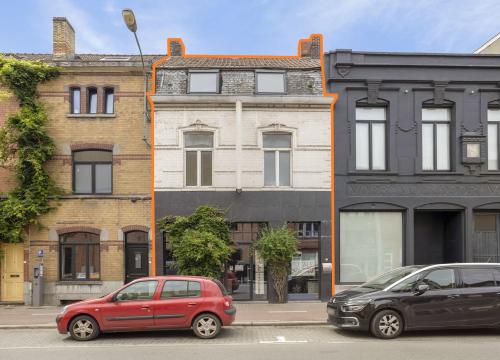 Op te knappen herenwoning met tuin te Kortrijk centrum!