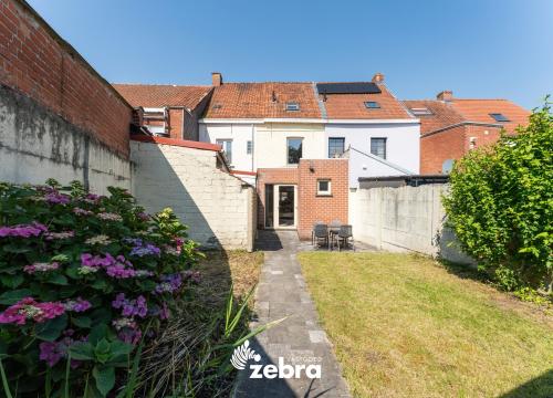 Instapklare woning met gezellige tuin te koop in centrum Tielt!